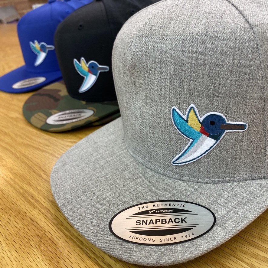Custom embroidered branded caps and polos